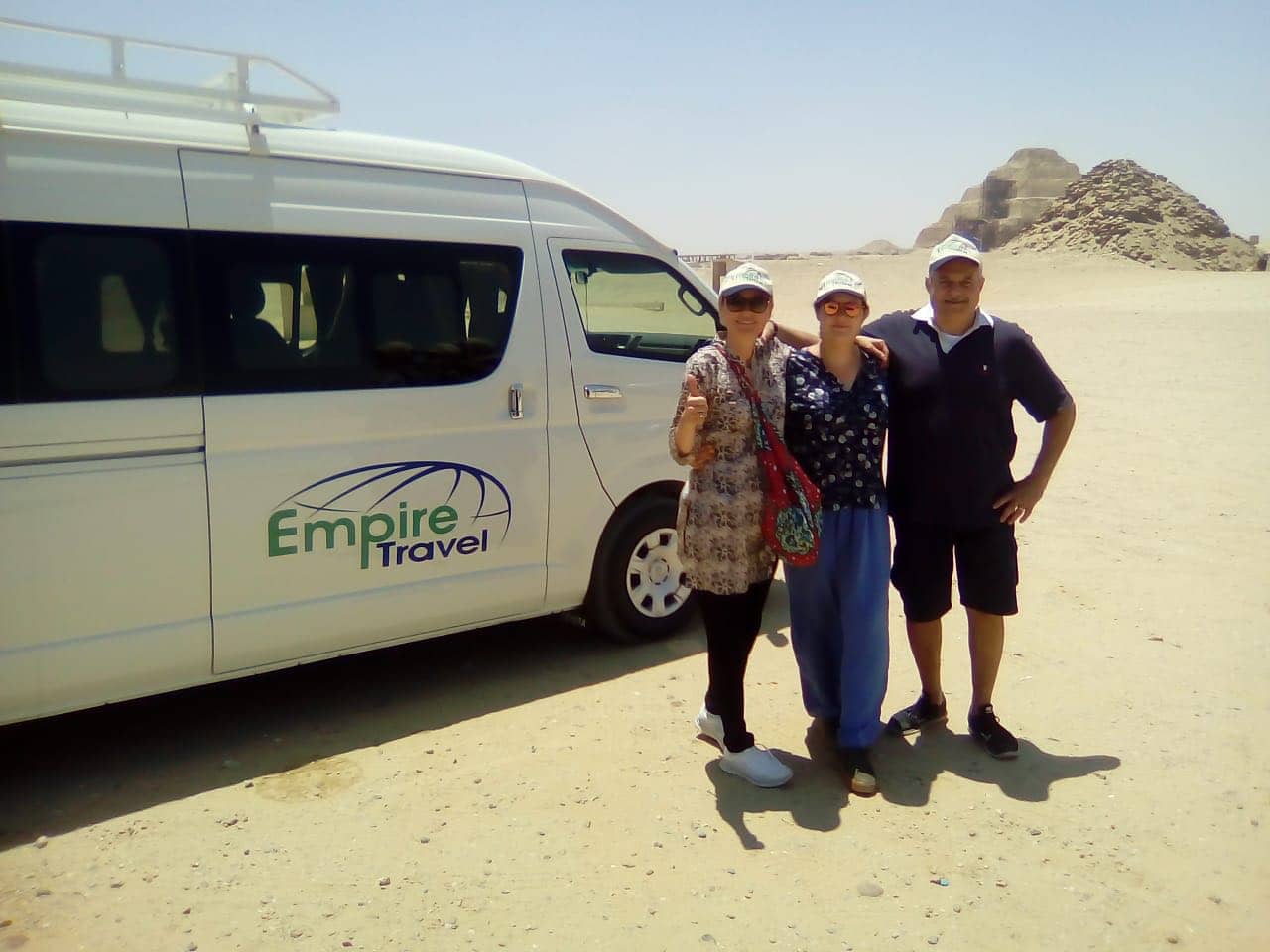 Travellers Photo with Empire Travel Bus